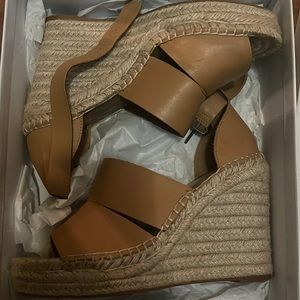 Treasure and bond strap wedges
